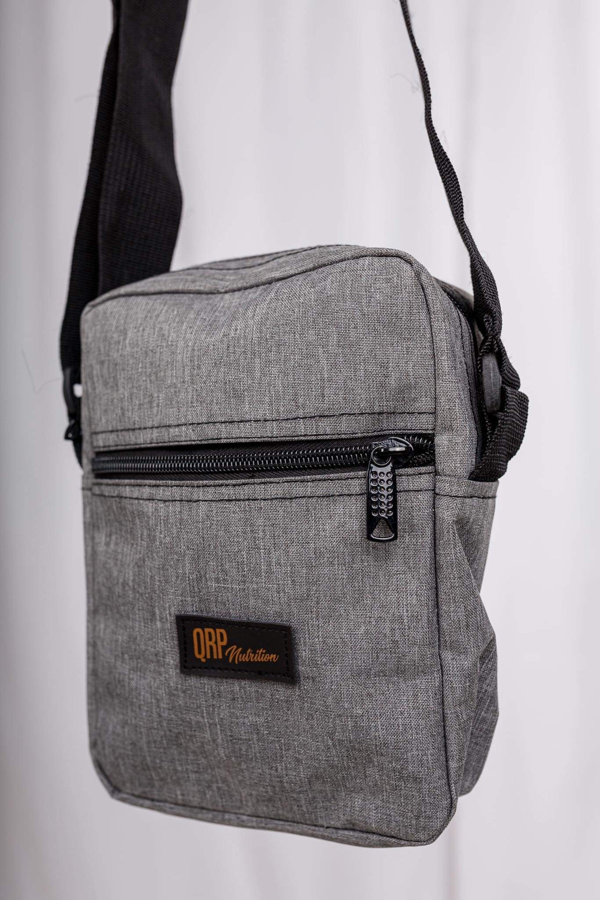 QRP Nutrition Mini Backpack Messenger Bag image 0
