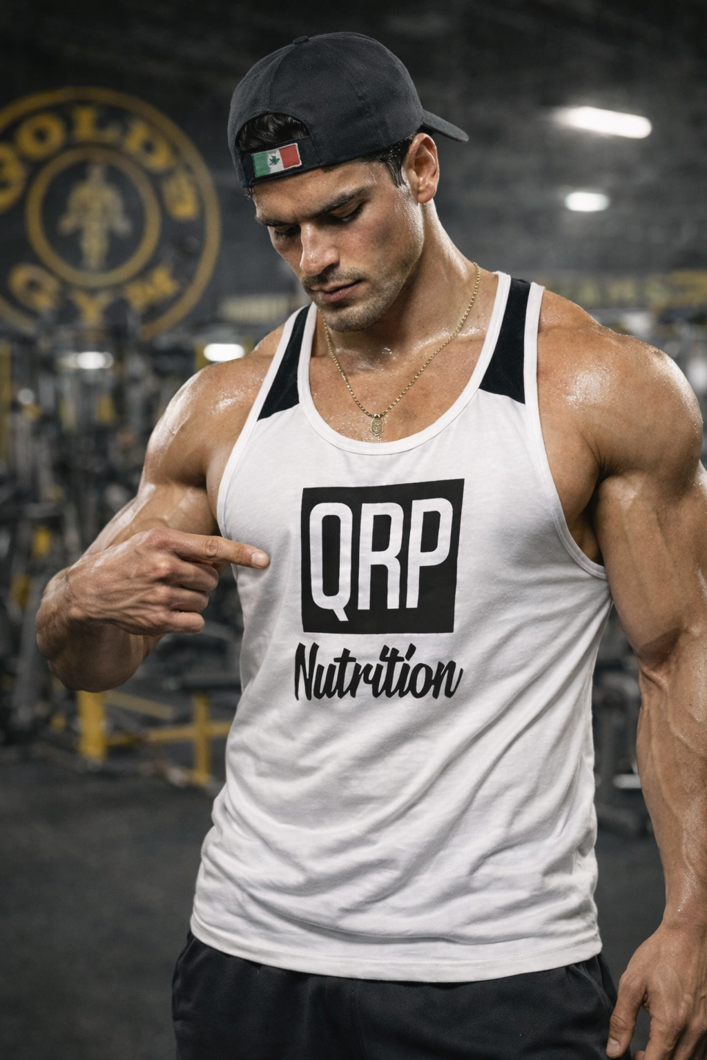 Muscular man pointing to a 'QRP Nutrition' tank top in a gym setting