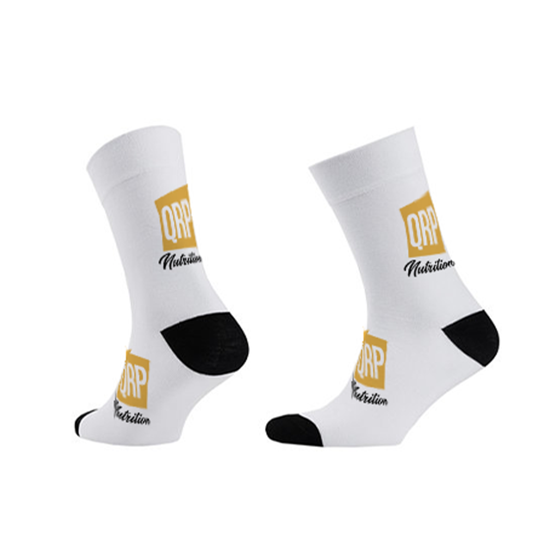 White socks with black toes and heels, featuring a logo and text on a white background