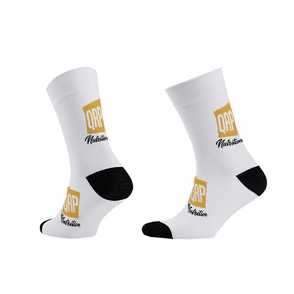 White socks with black toes and heels, featuring a logo and text on a white background