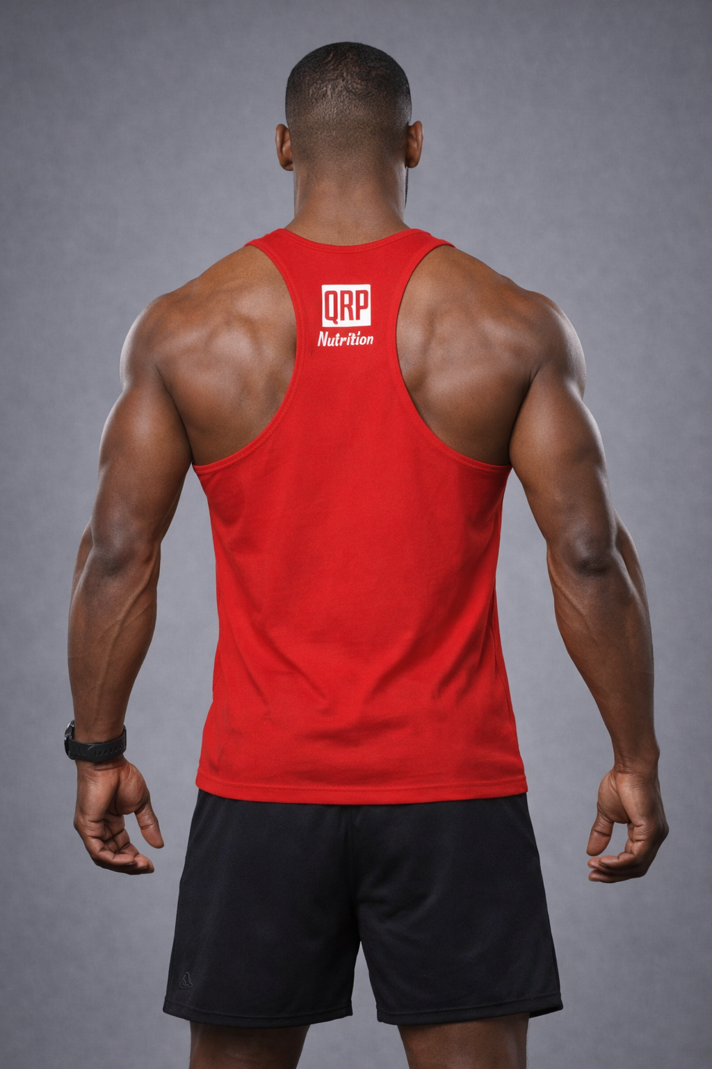 Person wearing a red tank top with a visible brand logo on the back, against a gray background