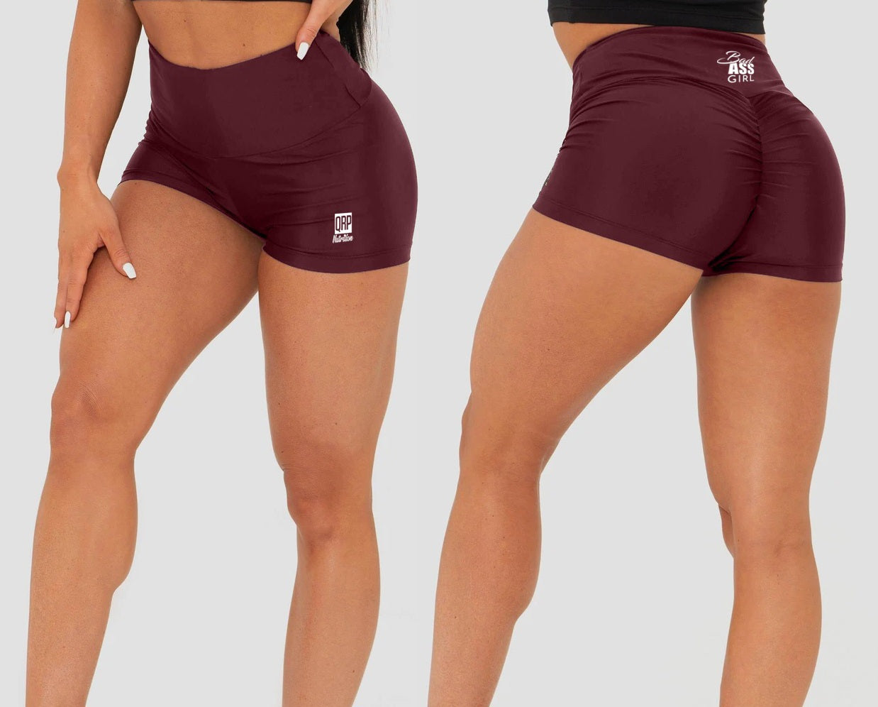 Maroon athletic shorts with a logo on a plain background