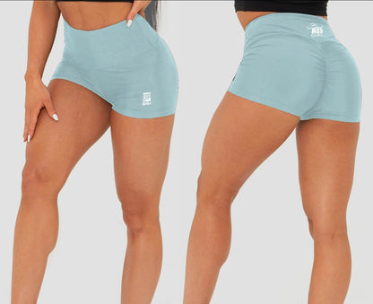 Light blue athletic shorts worn by a person on a plain background